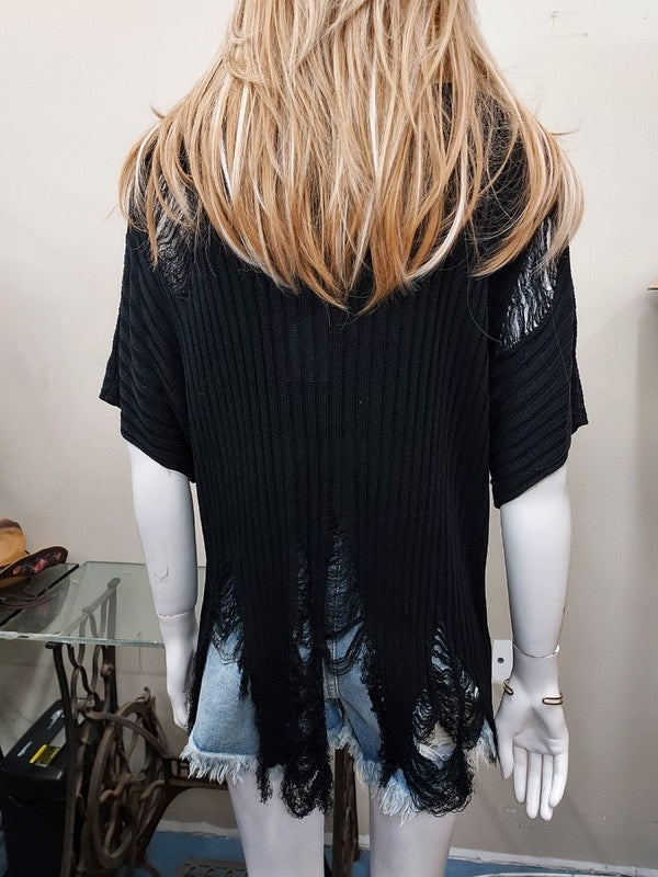 Distressed sweater black top